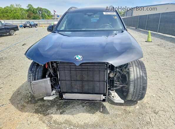 5UX33EM02P9R10717 2023 BMW X7 Black Դիմացի տեսք