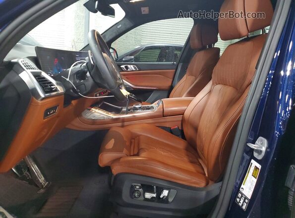5UX33EM09S9Y51416 2025 BMW X7 Синий Вид салона спереди