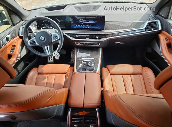 5UX33EU02R9S58782 2024 BMW X5 Зеленый Вид панели приборов