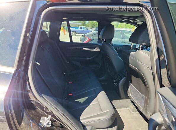5UX43DP05R9W75050 2024 BMW X3 Black Vista interior trasera