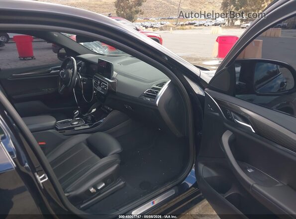 5UX43DT03P9P77661 2023 BMW X4 Черный Вид салона спереди
