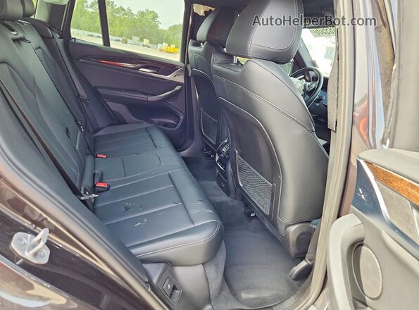 5UX53DP00N9M98972 2022 BMW X3 Black Vista interior trasera