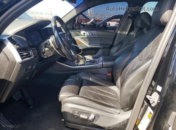 5UXCR4C09P9P56033 2023 BMW X5 Черный Вид салона спереди