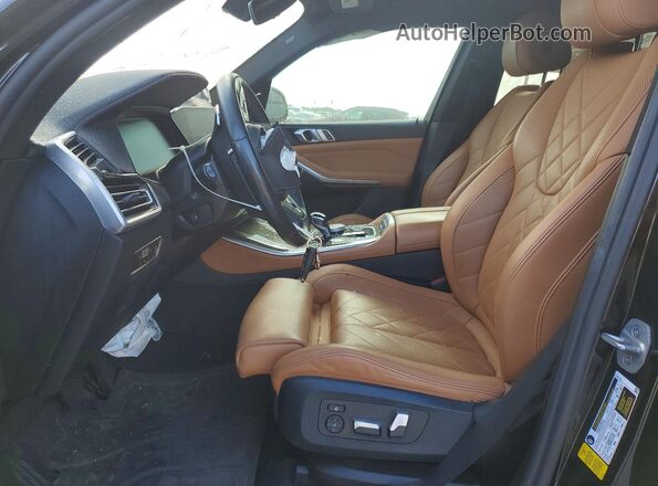 5UXCR4C09P9P60244 2023 BMW X5 Black Front interior view