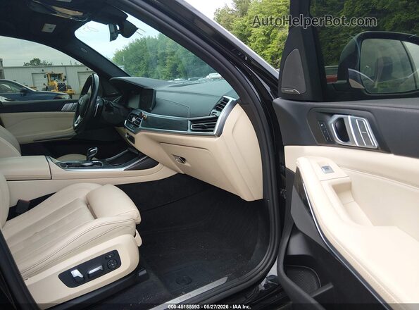 5UXCW2C02M9E41103 2021 BMW X7 Black Widok wnętrza z przodu