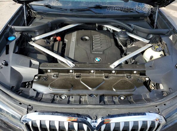 5UXCW2C06L9B40901 2020 BMW X7 Charcoal Vista del compartimento del motor