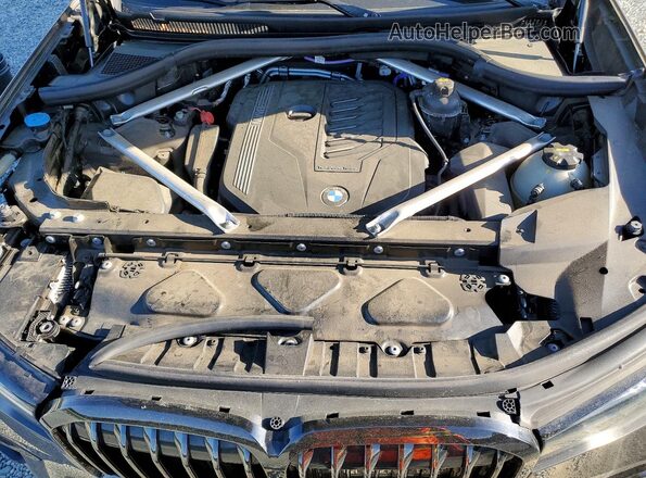 5UXCW2C08N9L66390 2022 BMW X7 Brown Vista del compartimento del motor