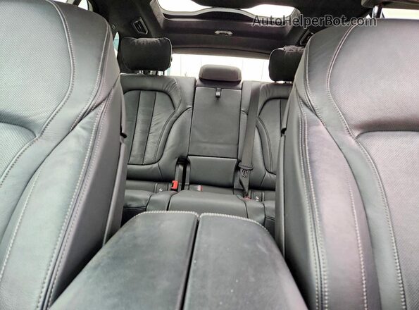 5UXCW2C09L0E74263 2020 BMW X7 Blue Widok tylnych siedzeń