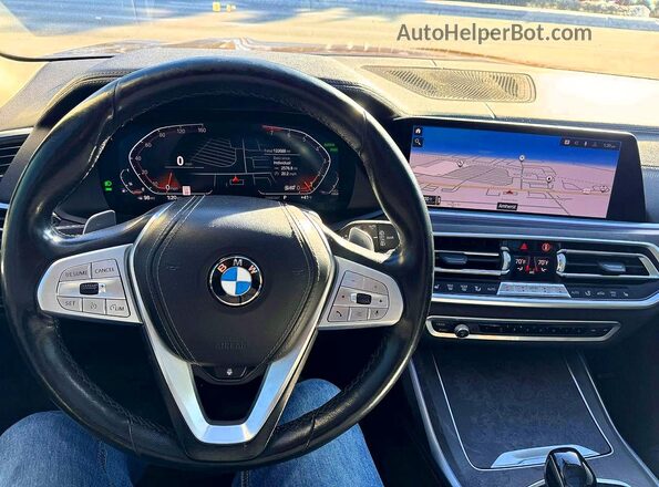 5UXCW2C09L9A00387 2020 BMW X7 Коричневый Вид салона спереди
