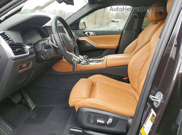 5UXCY6C02P9P88613 2023 BMW X6 Черный Вид салона спереди