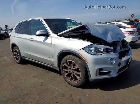 5UXKR2C58J0Z14045 2018 BMW X5 Серебряный Передняя правая четверть