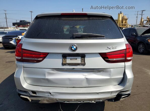 5UXKR2C58J0Z14045 2018 BMW X5 Серебряный Вид сзади