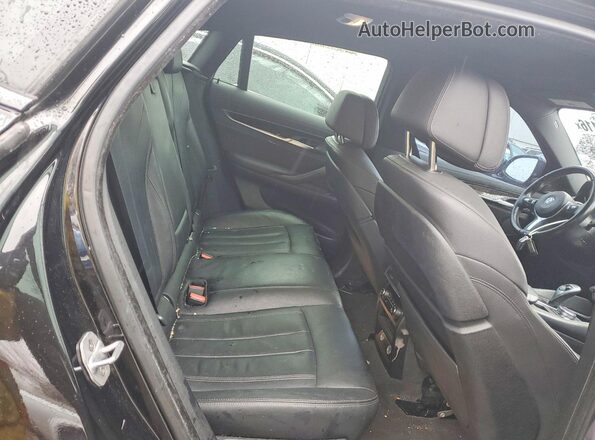 5UXKU2C56J0Z62058 2018 BMW X6 Черный Вид задней части салона