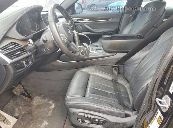 5UXKU2C56J0Z62058 2018 BMW X6 Черный Вид салона спереди