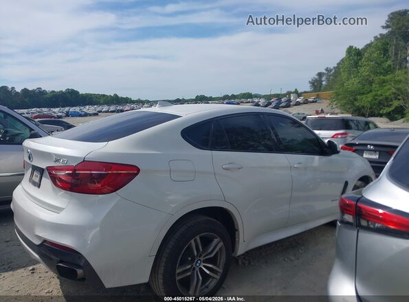 5UXKU6C56J0Z66604 2018 BMW X6 Белый Вид задней части салона