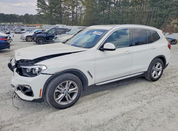 5UXTR7C59KLF24897 2019 BMW X3 White Vista tres cuartos delantera izquierda