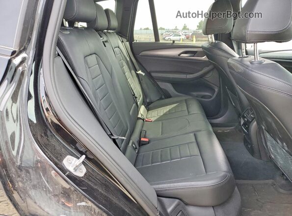 5UXTS3C50J0Y96820 2018 BMW X3 Черный Вид задней части салона
