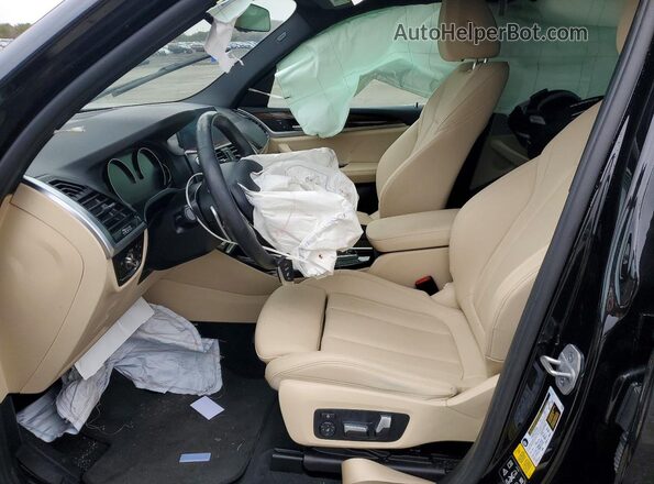 5UXTY5C03M9E39730 2021 BMW X3 Black Widok wnętrza z przodu