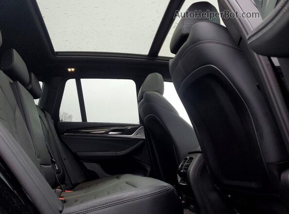 5UXTY5C09M9E54975 2021 BMW X3 Black Widok wnętrza z tyłu