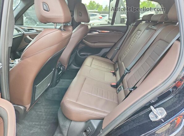 5UXTY9C07LLE59858 2020 BMW X3 Blue Вид задньої частини салону