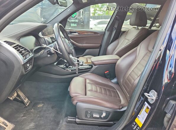 5UXTY9C07LLE59858 2020 BMW X3 Blue Вид салону спереду