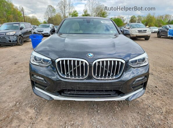 5UXUJ3C58KLG54531 2019 BMW X4 Черный Вид спереди