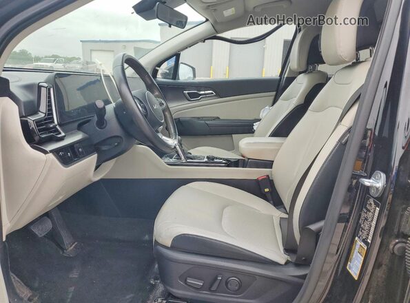 5XYK33AF3PG025399 2023 KIA SPORTAGE Black Widok wnętrza z przodu