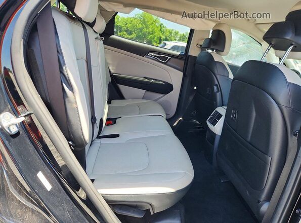 5XYK33AF3PG034457 2023 KIA SPORTAGE Black Rear interior view