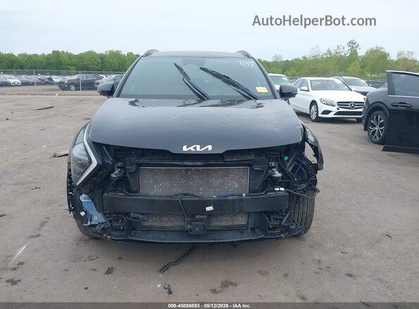5XYK5CAFXPG080863 2023 KIA SPORTAGE Черный Вид задней части салона