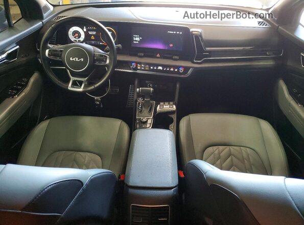 5XYK7CDF5RG178711 2024 KIA SPORTAGE Зеленый Вид панели приборов