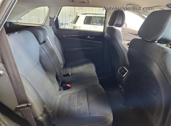5XYPG4A39GG057733 2016 KIA SORENTO Gray Vista interior trasera