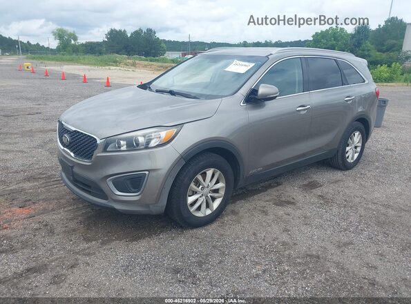 5XYPGDA55GG177000 2016 KIA SORENTO Gray Vista tres cuartos delantera izquierda