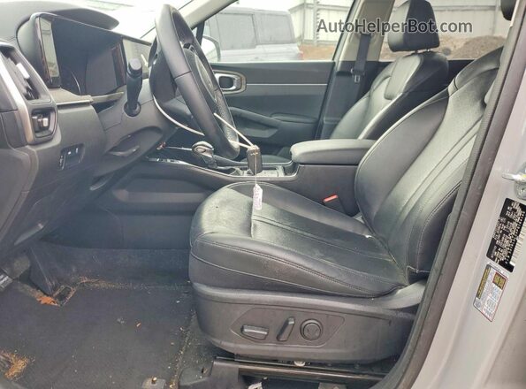 5XYRLDLCXPG164145 2023 KIA SORENTO Серебряный Вид салона спереди