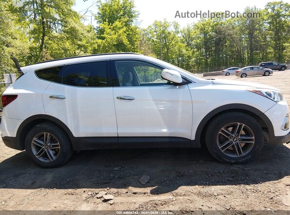 5XYZUDLB5JG546952 2018 HYUNDAI SANTA FE SPORT White Widok wnętrza z tyłu