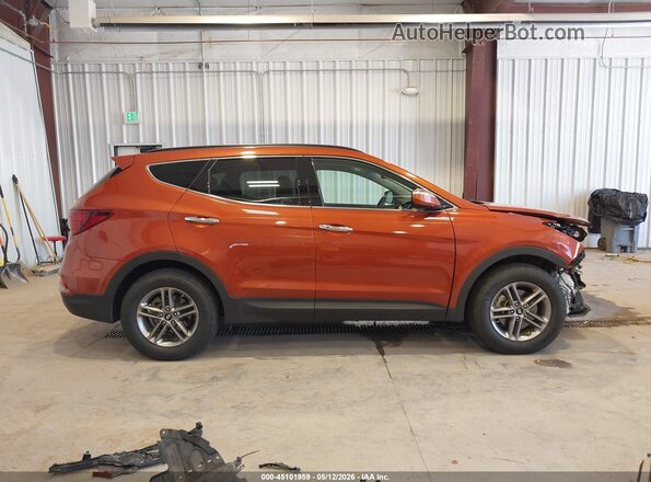 5XYZUDLB8HG473845 2017 HYUNDAI SANTA FE SPORT Orange Widok wnętrza z tyłu
