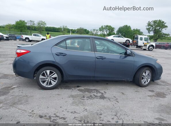 5YFBPRHE8GP444932 2016 TOYOTA COROLLA Серый Вид задней части салона