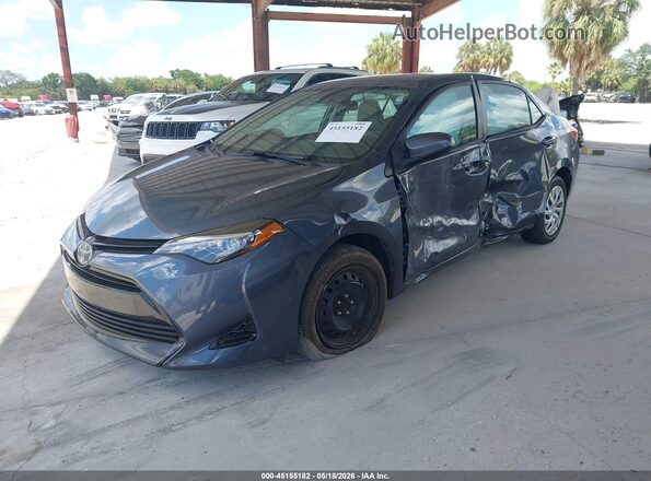 5YFBURHE2HP697500 2017 TOYOTA COROLLA Серый Передняя левая четверть