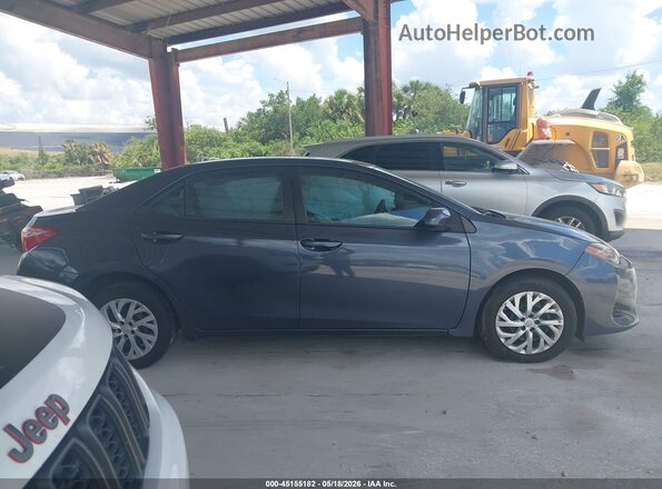 5YFBURHE2HP697500 2017 TOYOTA COROLLA Серый Вид задней части салона