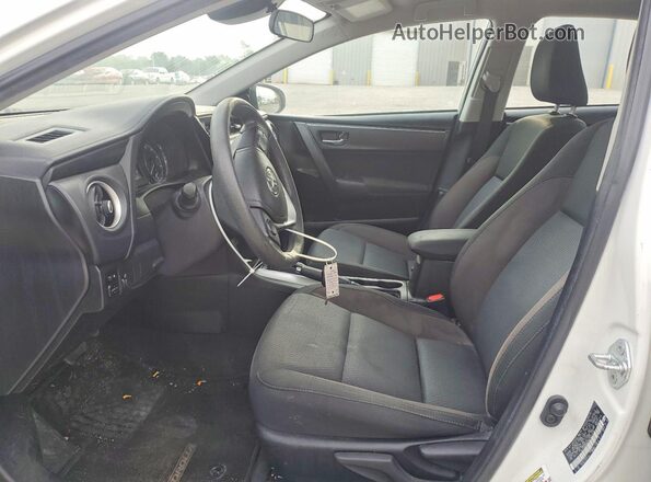 5YFBURHE2KP937216 2019 TOYOTA COROLLA Белый Вид салона спереди