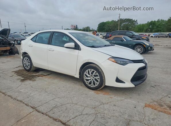 5YFBURHE2KP937216 2019 TOYOTA COROLLA Белый Передняя правая четверть
