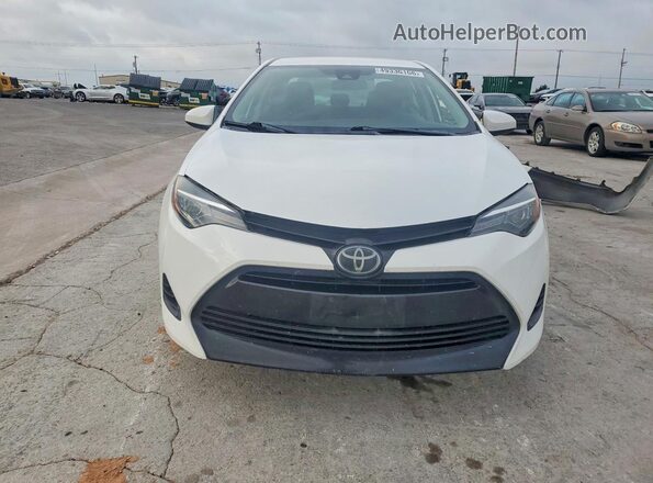 5YFBURHE2KP937216 2019 TOYOTA COROLLA Белый Вид спереди