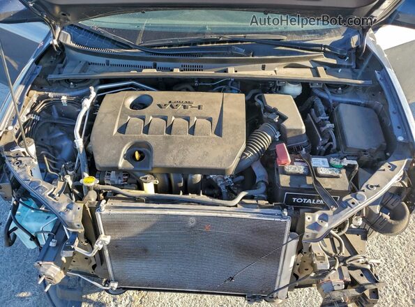 5YFBURHE4HP665678 2017 TOYOTA COROLLA Серый Вид задней части салона