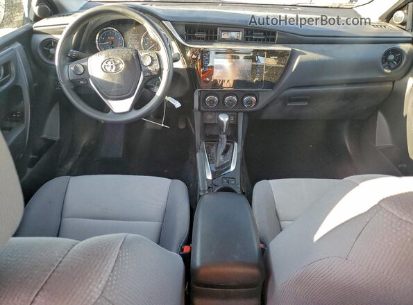 5YFBURHE4HP665678 2017 TOYOTA COROLLA Серый Вид панели приборов