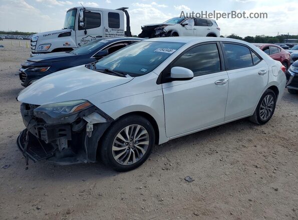 5YFBURHE4HP707735 2017 TOYOTA COROLLA White Առջևի ձախ երեք քառորդ տեսարան