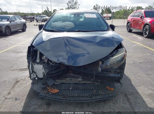 5YFBURHE4HP723899 2017 TOYOTA COROLLA Серый Вид спереди