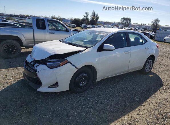 5YFBURHE4KP879058 2019 TOYOTA COROLLA Белый Передняя левая четверть