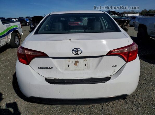 5YFBURHE4KP879058 2019 TOYOTA COROLLA Белый Вид сзади