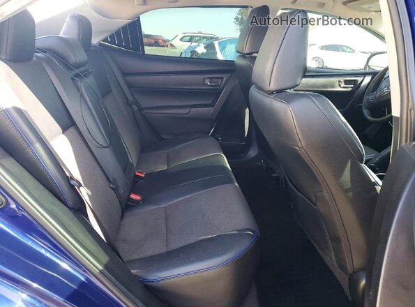 5YFBURHE8HP676053 2017 TOYOTA COROLLA Blue Rear seats view