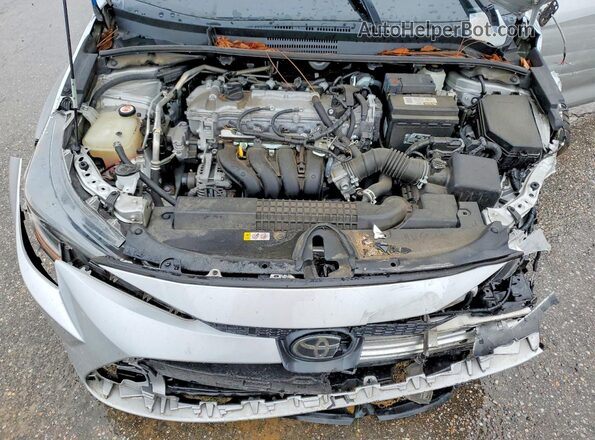 5YFEPMAE5NP286587 2022 TOYOTA COROLLA Silver Vista interior trasera