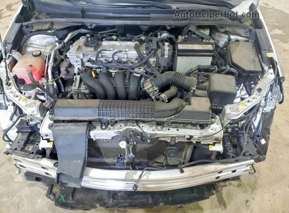 5YFEPMAE8NP291296 2022 TOYOTA COROLLA Серебряный Вид задней части салона